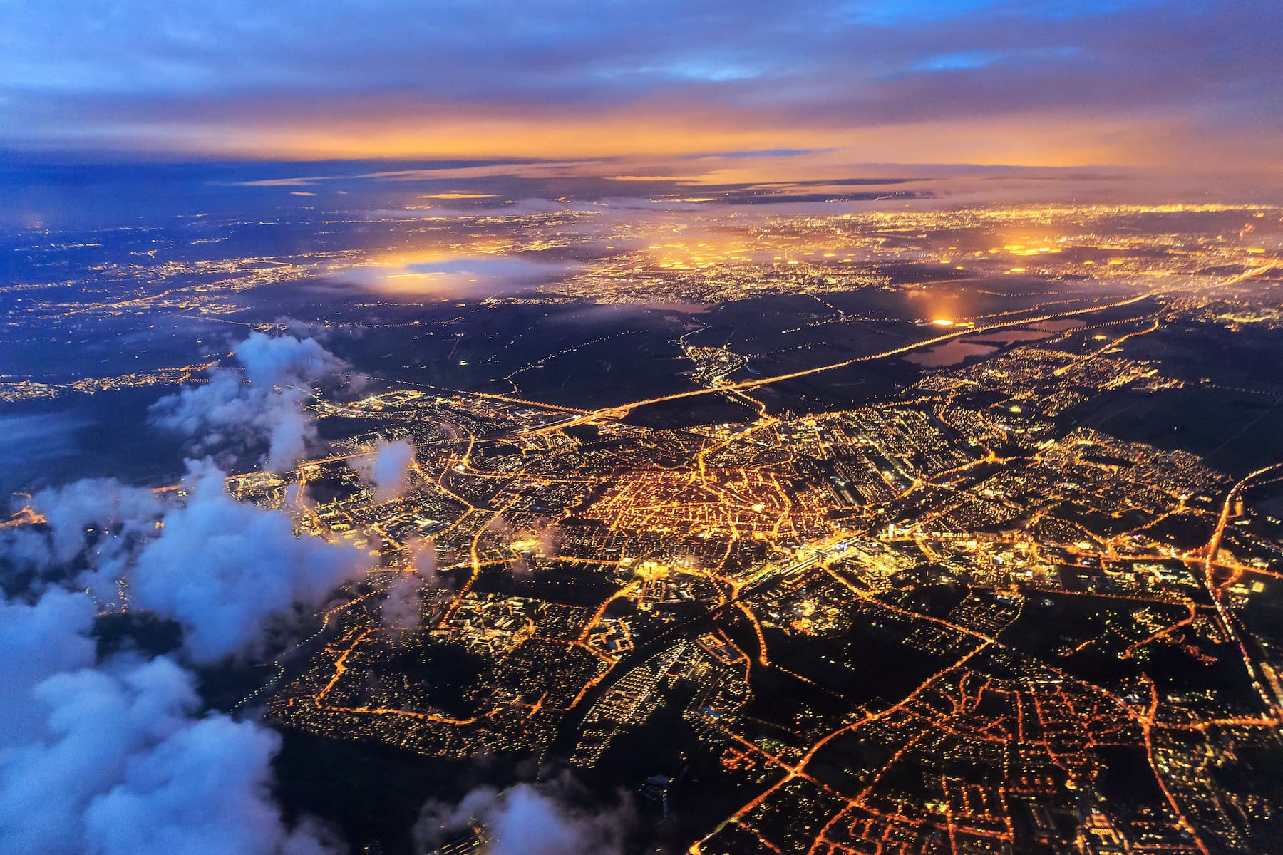 Global skyline representing the global reach of Skiniti Partners
